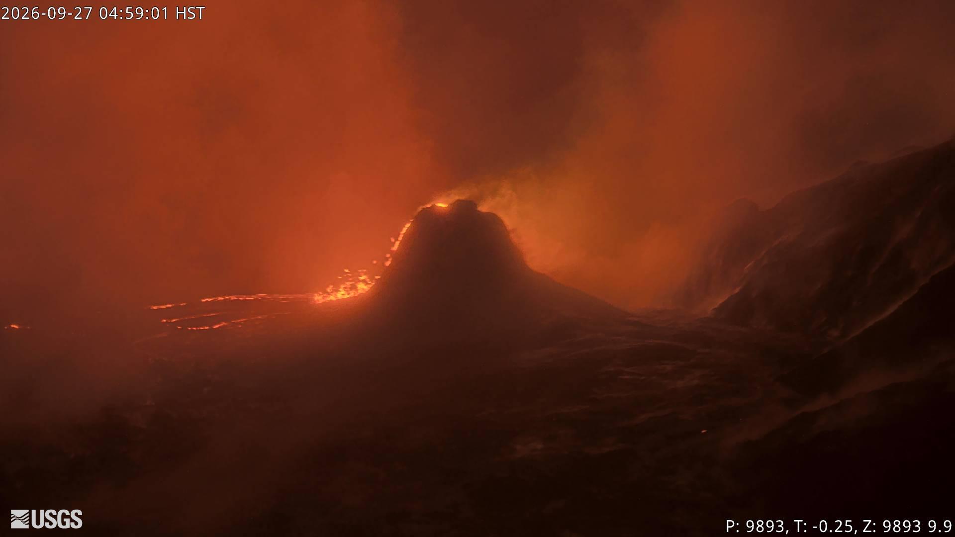 USGS V1cam webcam frame of Halemaʻumaʻu crater at Kīlauea’s summit before dawn, with incandescent glow in the crater, timestamped 2026-09-27 04:59:01 HST